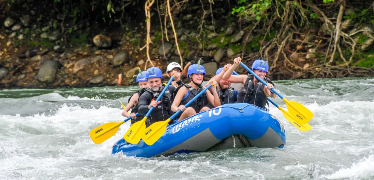 Group paddling together during a Wave Expeditions rafting tour in Costa Rica